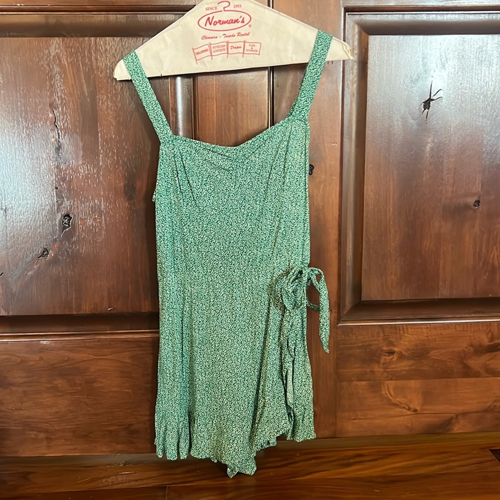 cute green romper size xs.